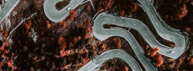 a zig-zag road viewed from above